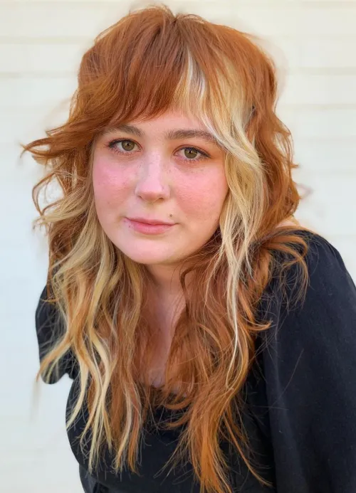 Voluminous Wolf Haircut with Wispy Layers
