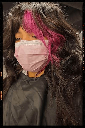 Wolf Haircut With A Touch Of Bold Pink Streaks